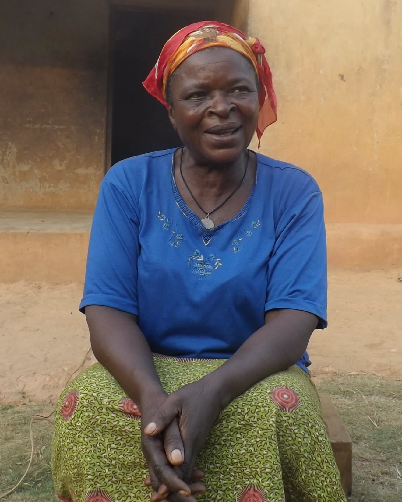 Odey Cecilia, a widow in Utugwang full of smiles and praise to DR PETER OTI